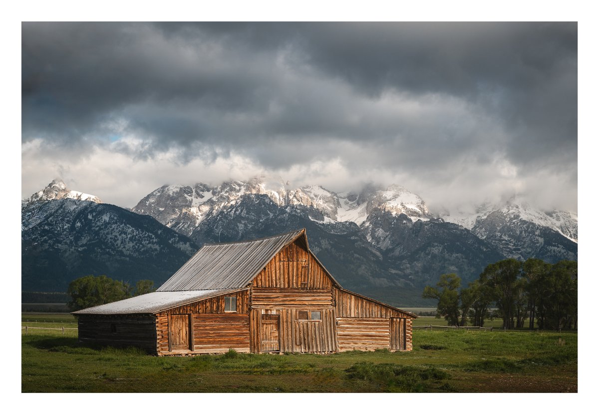 Fresh snow, storm clouds, and the Moulton Barn beneath the Tetons. A scene that feels timeless, no matter how many times I see it.