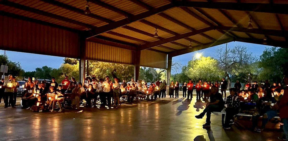 Kenzie__Brooke's tweet photo. Last night, this small town in Texas lit up the night for Charlie — not by fire and looting, but by candlelight and prayer.  
#WeAreNotTheSame https://t.co/vjdC2XIcAU