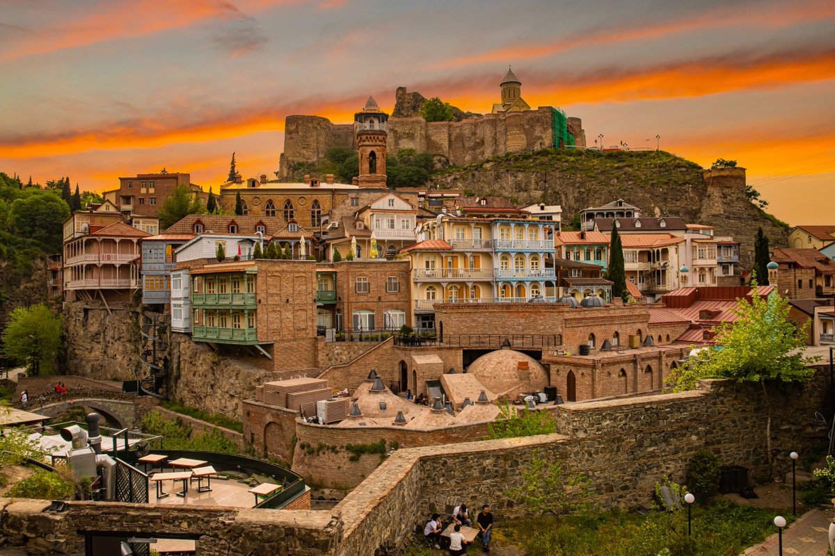 Tbilisi’s balconies aren’t just charming, they’re iconic! 🏰

Colorful, carved wooden balconies spill over narrow lanes and give the city its layered, romantic feel ✨

💡 Try the traditional qvevri wine aged in clay pots, and pair it with khinkali (Georgian dumplings)