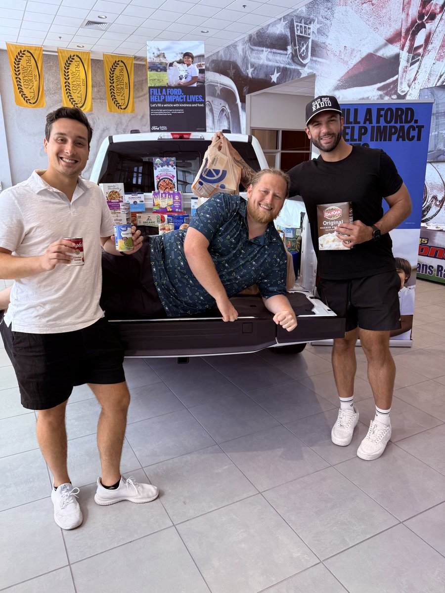 <a href="/BuckReising/">Buck Reising</a> and <a href="/lucaspanzica/">Lucas Panzica</a> surround the lounging <a href="/Robby_Walsh/">Bert</a> for our “Fill A Ford” food drive! We’re collecting through 9/30! <a href="/Ford/">Ford Motor Company</a> <a href="/MidSouthFord/">Mid-South Ford</a>