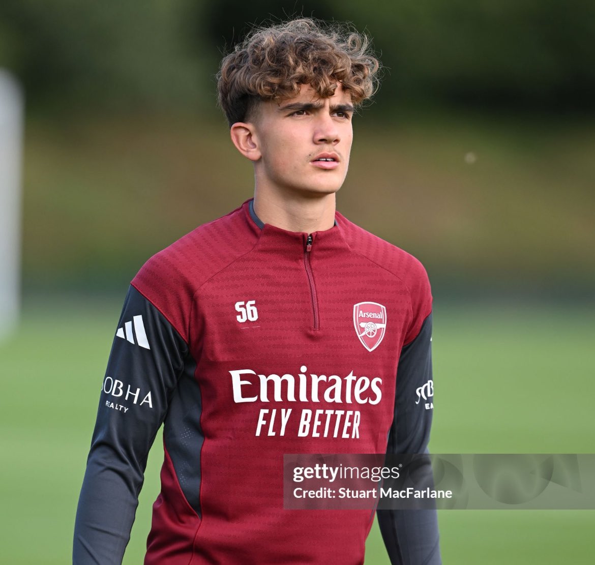 It was already more or less clear but Dowman having ‘56’ on his training kit rather than ‘U19’ indicates his official promotion to the first-team squad, which is different from involvement in matches etc. 

He will probably get a lower number next season if he wants one.