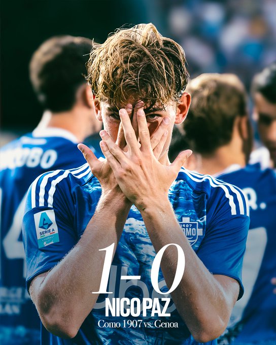 Nico Paz wearing a blue Como 1907 soccer jersey with white stripes, standing on a field with teammates in similar uniforms behind him. His hands cover his face, showing an expressive gesture. The jersey has a patch with "Serie A" visible. Text overlay reads "1-0 Nico Paz Como 1907 vs. Genoa."