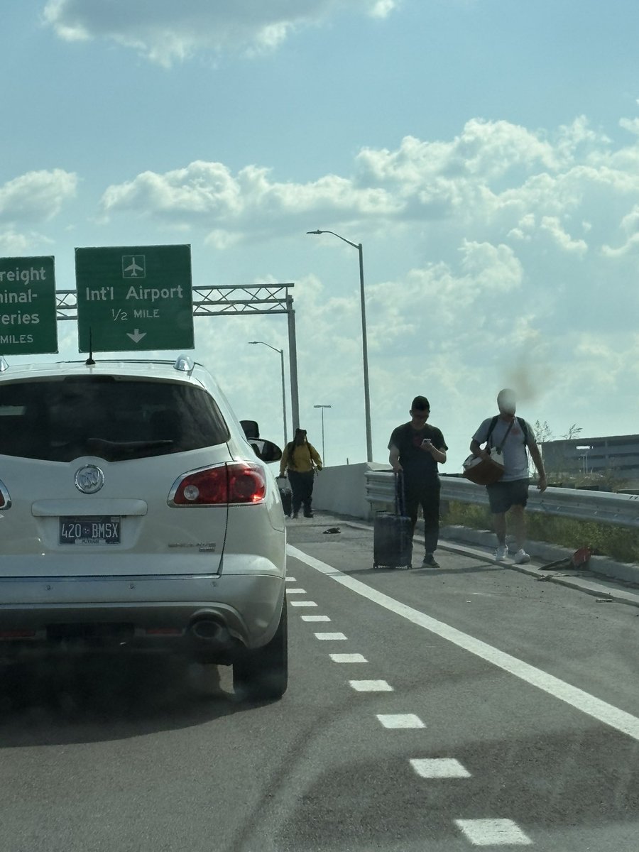 chilley13's tweet photo. @ErinTDOT @Fly_Nashville Why would this be done during the day time? There are people literally walking down the highway with bags… https://t.co/0SqD5yXUCF