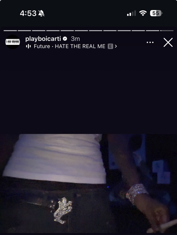 Playboi Carti showing off his YVL belt 💎