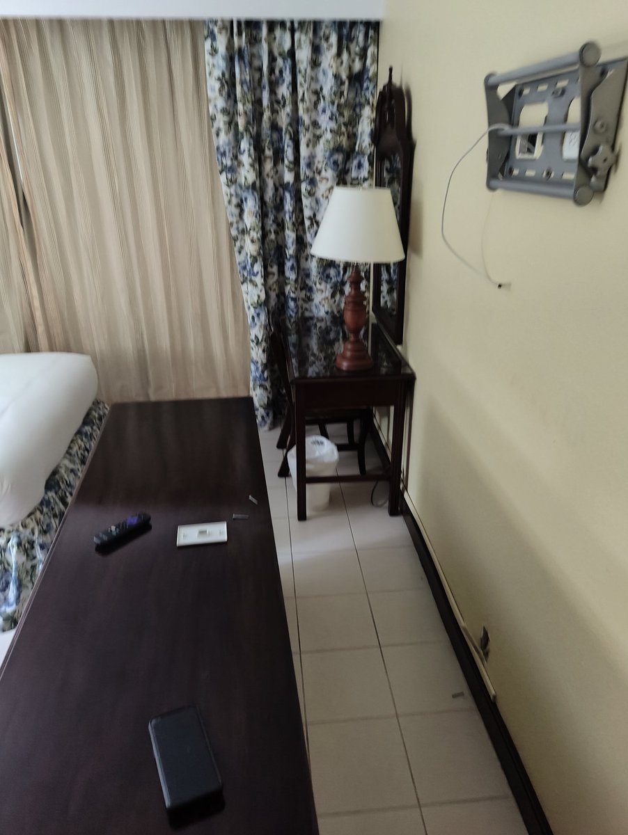 AdamThompson0_o's tweet photo. @TUIUK @ManchesterEven @LivEchonews @BBCNews @BBCBreaking @BBCLookNorth @TUIUK Some more pictures of this hotel. This is the room we've been given, furniture in the middle of the room, TV on the bed, holes in the walls, cracked/sharp floor tiles. and told by the staff "we can't fix it tonight so either move the stuff yourself or go to another hotel https://t.co/sJbhoryjWT