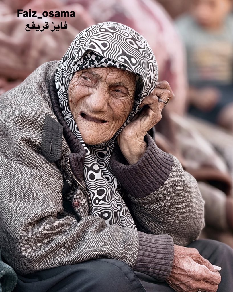 MsAleziitha's tweet image. This elderly Palestinian woman&apos;s wrinkled face indicates that she is older than the Jews came to our land, Palestine. She is still attached to the land, moving from one place to another, and her heart is attached to the land and its identity.