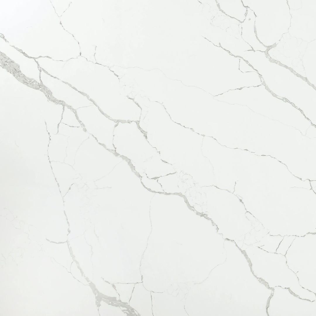 Elevate your interiors with Calacatta Tree quartz countertops—where luxury meets resilience. The intricate veining and luminous finish add a touch of refined elegance, making every moment in your space feel special. Explore our collection and redefine your home's aesthetic.