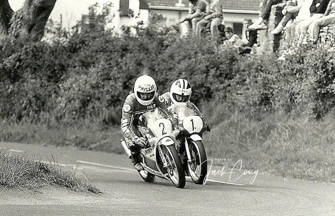 Twostroke Tuesday with <a href="/PhillipMcCallen/">Phillip McCallen</a> nipping up the inside of Robert Dunlop on the final corner of the Temple 100 125 race. I think this was the first 125 race that Phillip beat Robert in 1988? #roadracewarriors