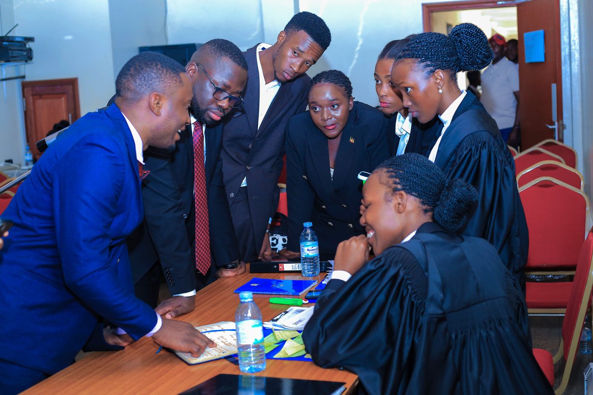 UCUniversity's tweet photo. Unwanted Witness Moot Court Competition: Our Moot team coordinator Joel Basoga, during one of the court session breaks, 'cooking' our sweet victory.

Kudos to @JoelBasoga and your team for sharpening our young, brilliant legal minds at UCU. The hard work has paid off!

See you in Tanzania! #Apply2UCU