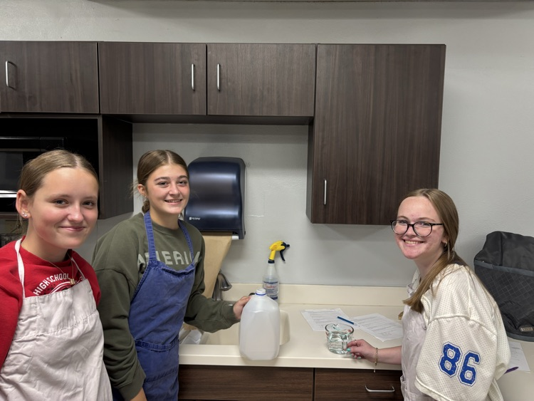 Ms Stille's Foods 1 class practicing their measurements before cooking.