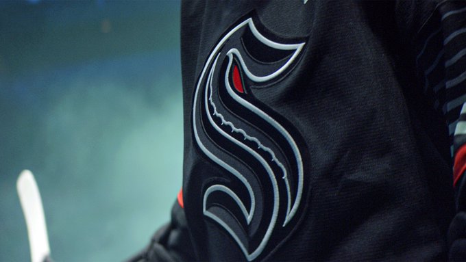 A close up of a glow in the dark Seattle Kraken’s stealth crest.