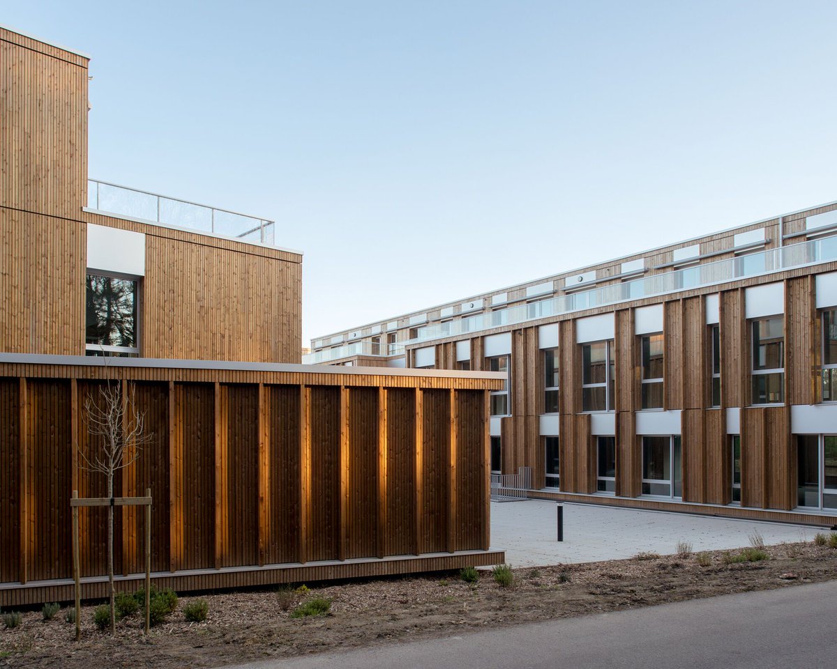 Archello's tweet photo. The Harel Wooden Office Complex by @altaarchitectes  – urbanistes uses timber construction to bridge countryside and city on Rennes’ edge. 
https://t.co/4UUfYoPMIi 

#TimberArchitecture #SustainableDesign #MaterialIntegrity https://t.co/p4r7DfVsdB
