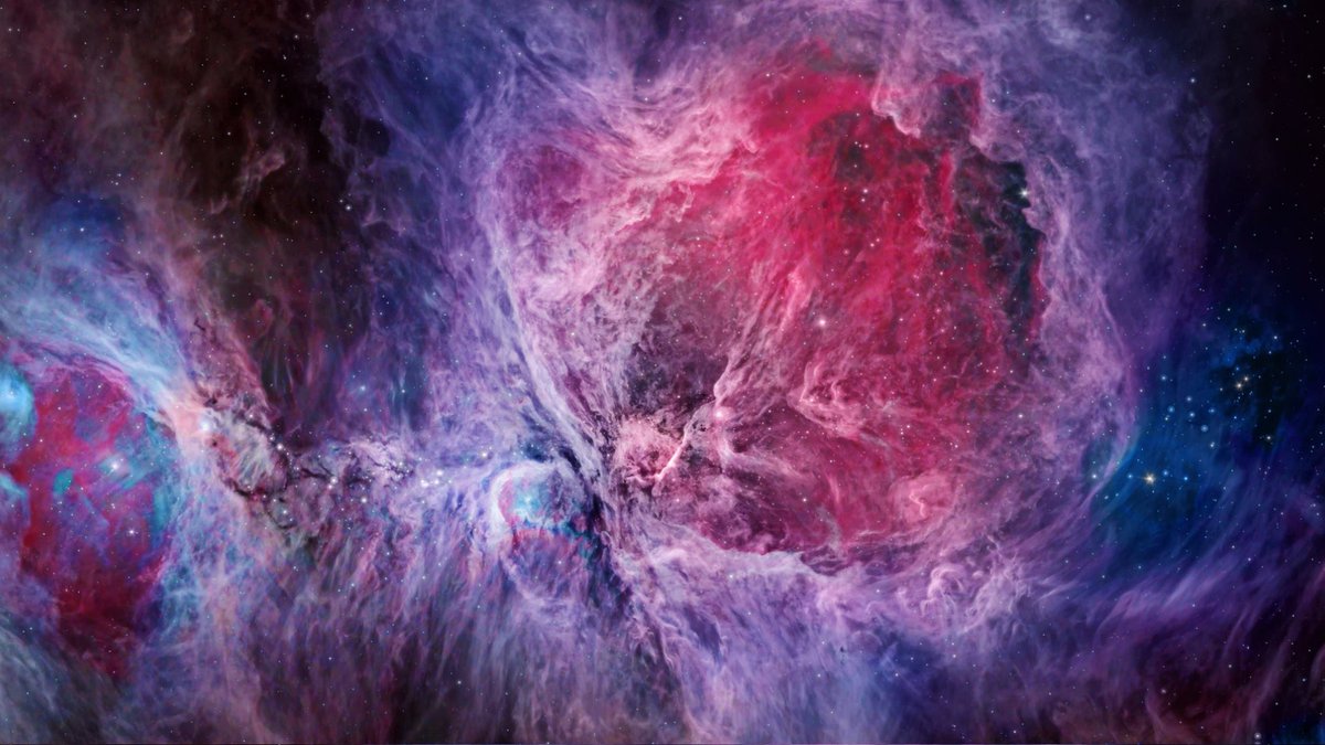 Esta colorida imagen podría parecer algún tipo de cuadro, pero se trata en realidad de la Nebulosa de Orión, vista en una mezcla de espectro visible e infrarrojo (gracias al telescopio Spitzer). La Nebulosa de Orión es una región de formación de estrellas que mide 40 años-luz y