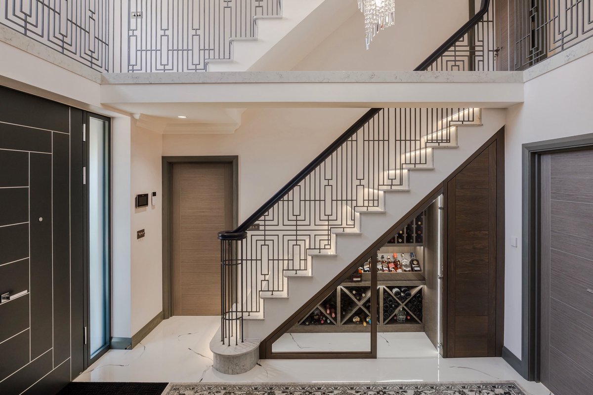 A stair lit at every tread.
A balustrade in rhythm.
A wine cellar hidden below.

#Dobuild #LondonInteriors #StaircaseDesign #WineCellar