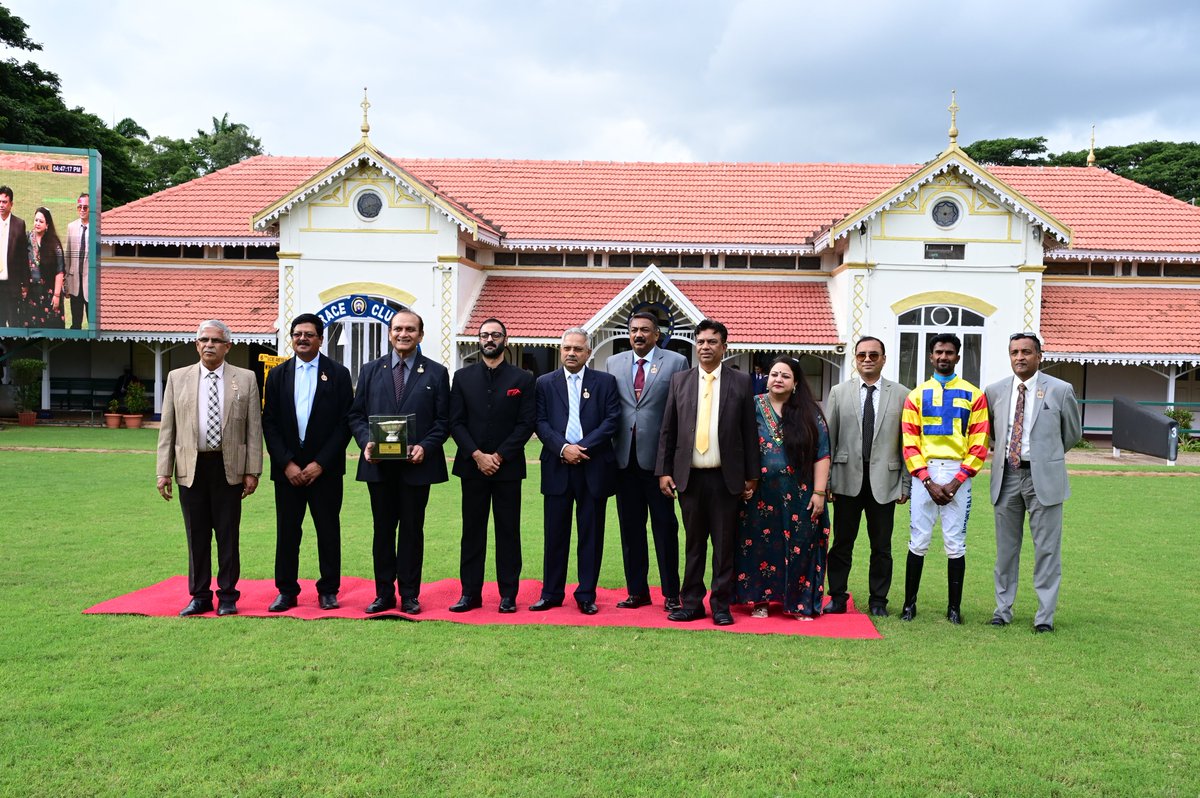 Mr.K.G.Vikram Muthanna,executive Director,The Academy News Papers, Presenting,
“The Star of Mysore Trophy”
To the Winner – PRETTY MOVE
Jockey –  Antony Raj S
Trainer – Rakesh
Trophy received by – Mrs Namrataa Rakesh, Mr M S Kumaraswamy &amp; Dr Vijaya Simha Doreswamy