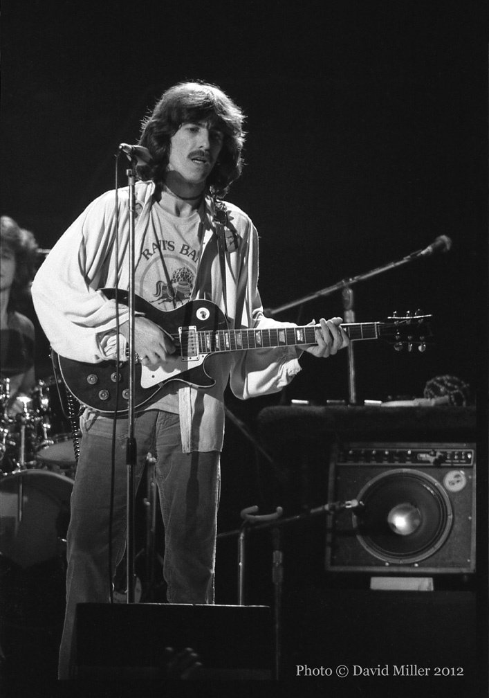 travelinwilbri's tweet photo. george harrison sporting a "ravi's band" shirt during the dark horse tour - november 8, 1974. (photos courtesy of david miller) https://t.co/XOH6YyBTaj
