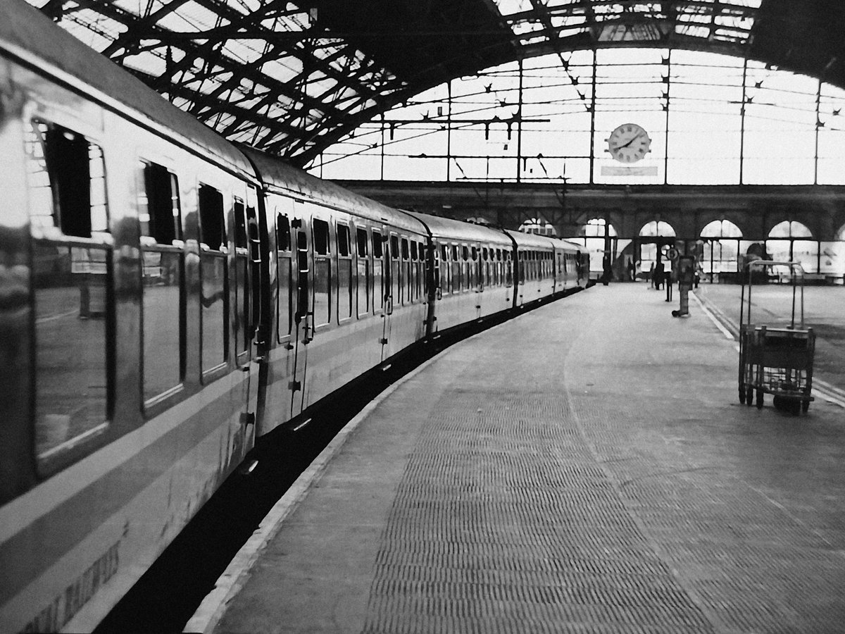 Invermuir's tweet image. Evening shadows fall on 31421 and its stock after working the 18.20 Llandudno Junction to Lime Street service on 6.8.1994 #tmrguk #reggierail #peds #class31