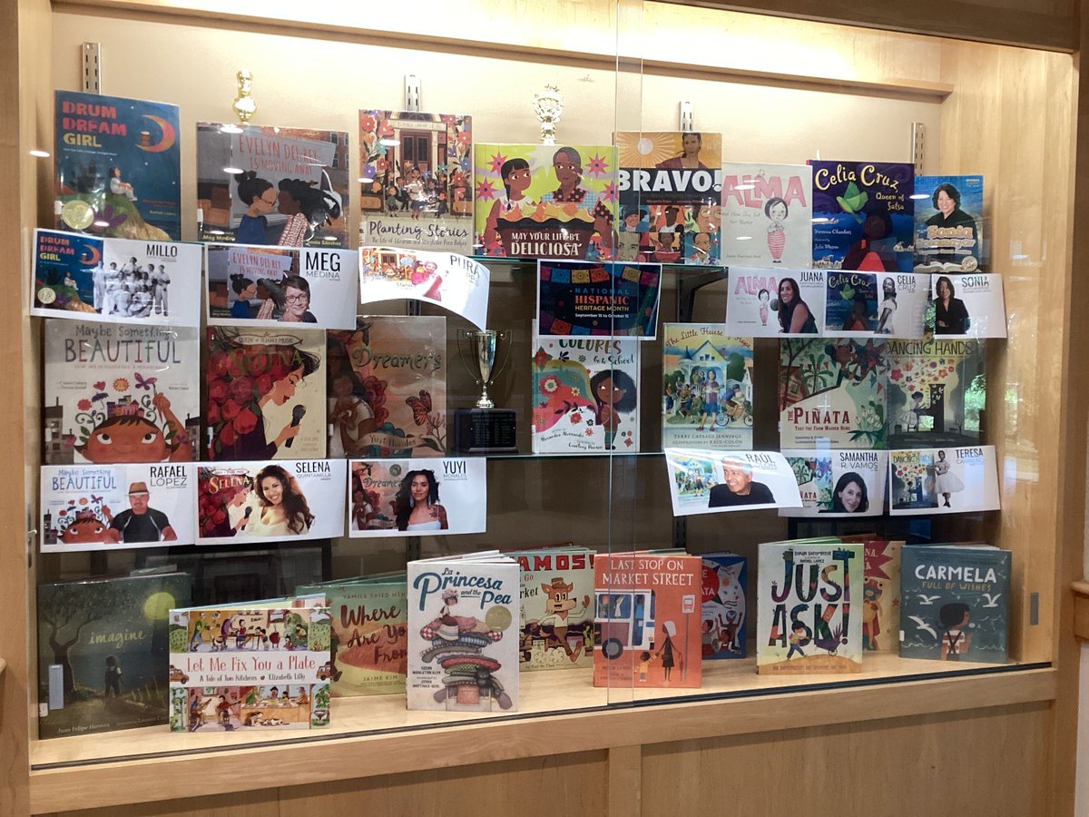 dancelibrarian's tweet image. Our lobby has become an extension of our library. Books celebrating #HispanicHeritage month are here. Students eating lunch or small groups can slide the doors and grab what they want to read. #BuildingCommunity