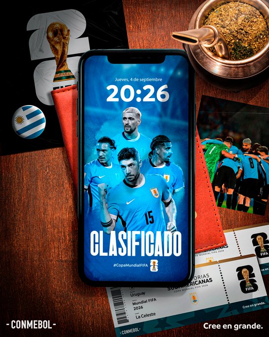 A smartphone displaying a screen with five soccer players in blue and white jerseys, including visible numbers like 15. The background is blue with text reading 