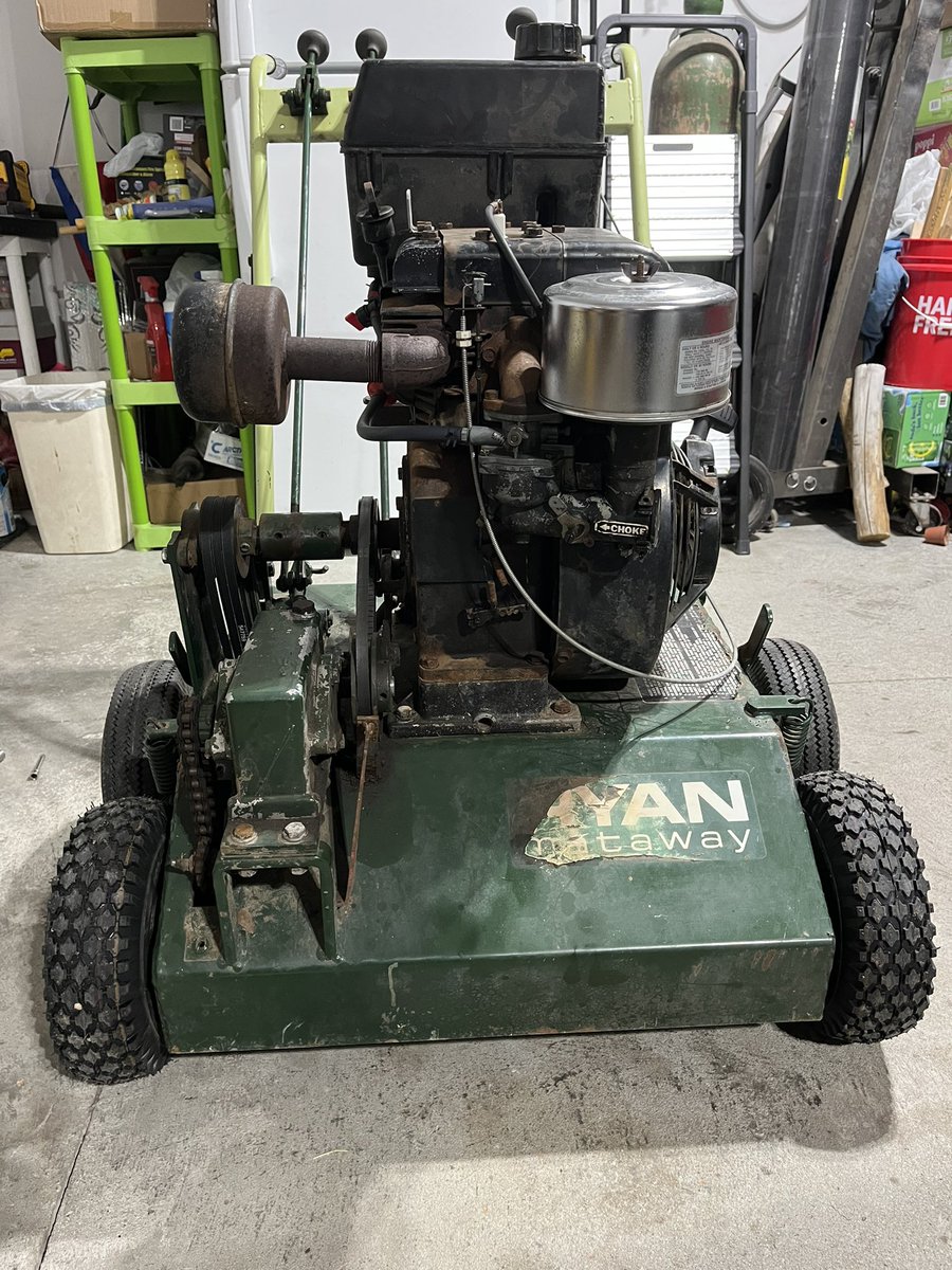sRugan's tweet photo. Really wanted a dethacher/slicer.  Found this 40yr old Ryan Mataway not running on the cheap. Replaced a couple belts, bearings, and tires and its ready to stir some dirt. https://t.co/QRmnD38S1x