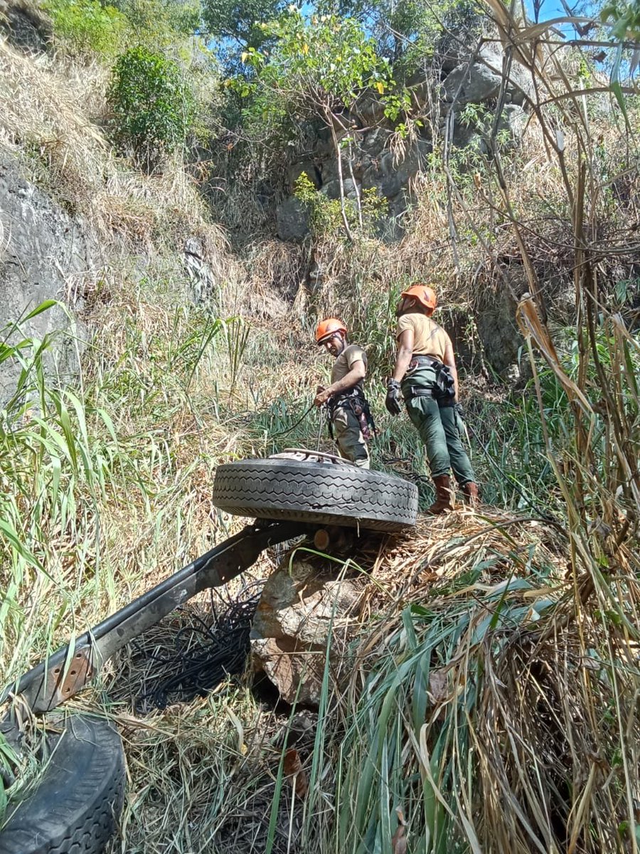 Sri Lanka Army personnel, including members of the Commando Regiment and Vijayabahu Infantry Regiment, conducting a high-risk rescue operation late at night to retrieve injured passengers from a bus that plunged nearly 500 meters into a ravine on the Ella–Wellawaya road.