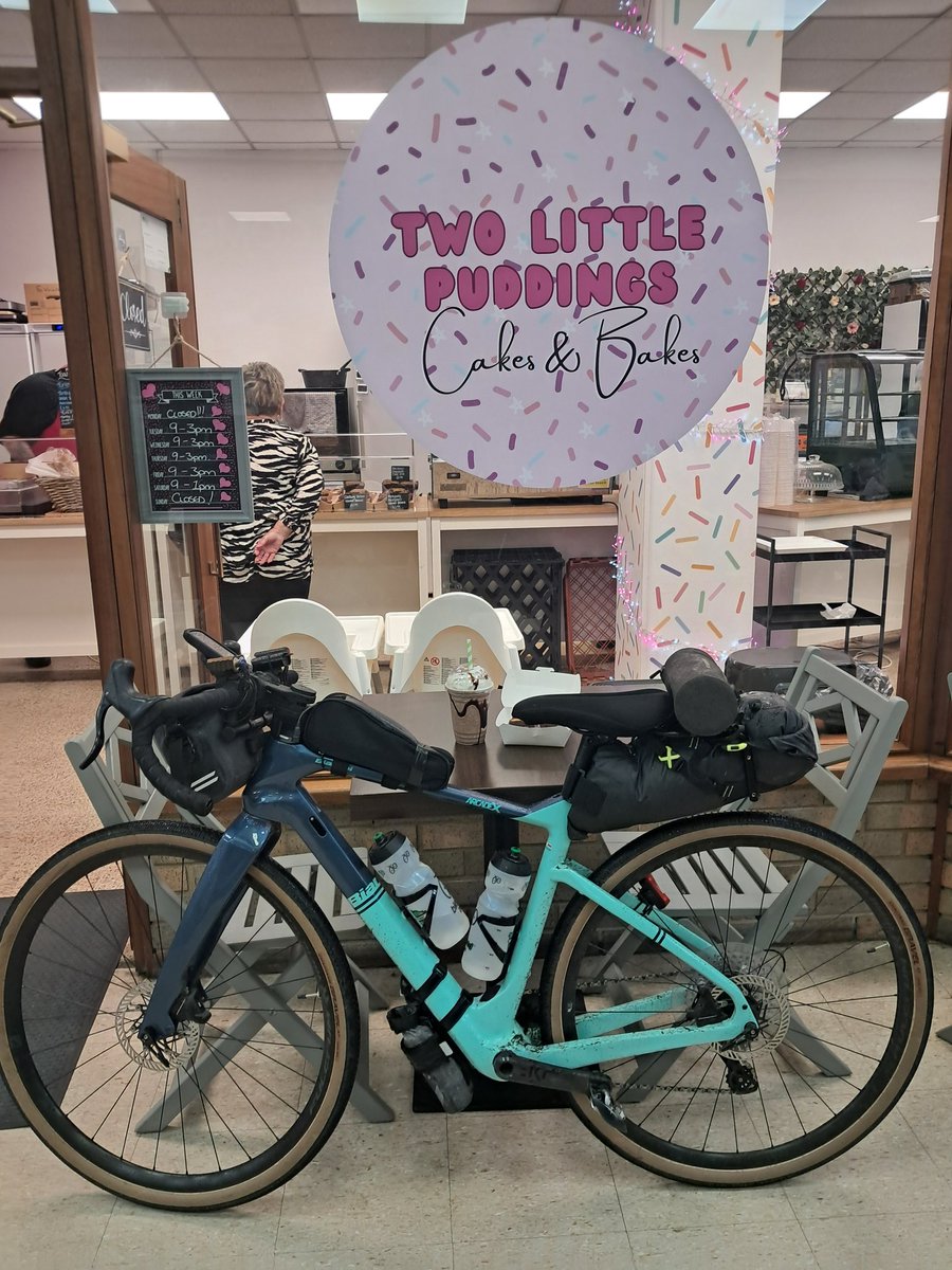 CB_cycles's tweet photo. It was 65km from Cambridge to Ampthill so as I battled my way across almost Flandrien countryside with weather to match I stopped in Sandy at this wonderfully cafe that gave even this chocoholic an overload just looking at the selection of cakes #TOBtour #TourofBritain #cycling https://t.co/vJ5ayZEYl5