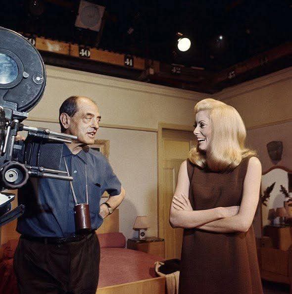 Luis Buñuel with Catherine Deneuve during the filming of “Belle de Jour”, 1967.