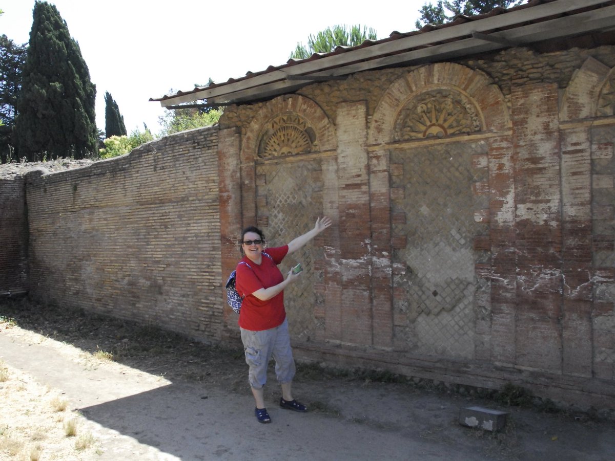 for_fi's tweet photo. The teenager found this photo from some years ago - I was so thrilled to see one of my favourite walls in Ostia! #romanwall https://t.co/qk8KY4q94B