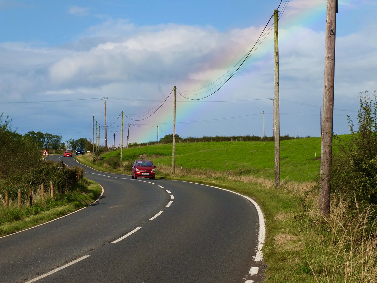 JohnJohnm53's tweet image. A beautiful rainbow over the Dundrod circuit looking up towards the Flowbog X.   It would be great to see the bikes thundering down here again.Wishful thinking I suppose.  #Dundrod #rainbows #roadraces