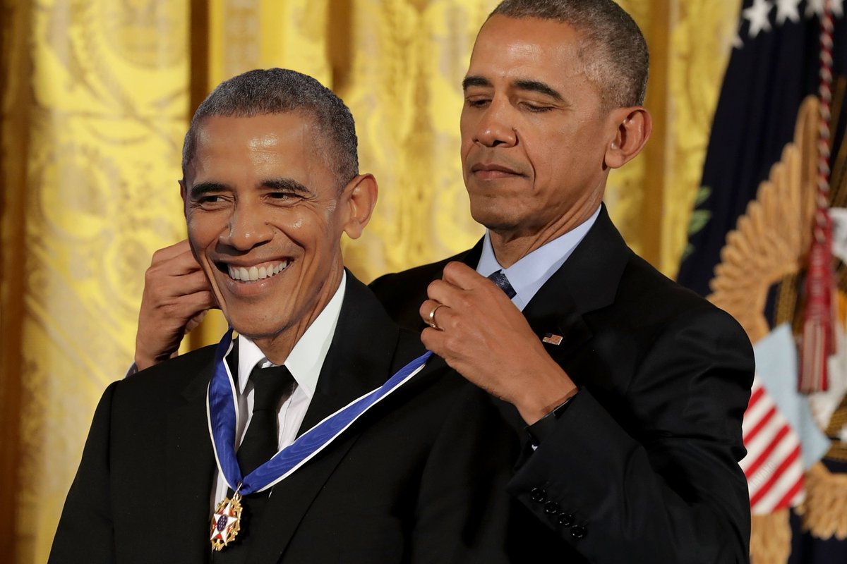 Meme image of Obama awarding a medal to Biden, satirizing Elon Musk's self-approval of his compensation package