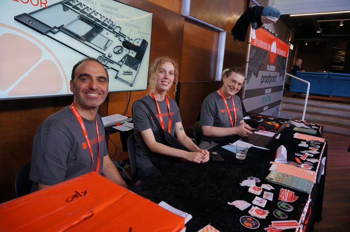 Check out our merch booth for some exclusive OrangeCon goods! 🧡 #merch #orange