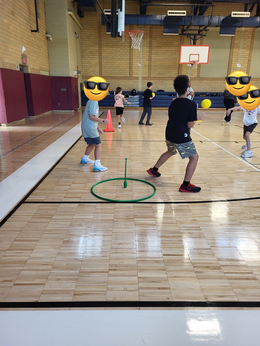 #physed... students defend their hoop and teammates attack the others... what do you call this game???