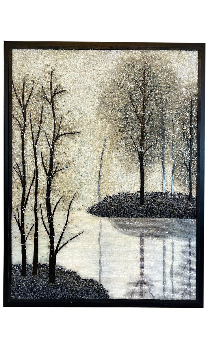Sabrina Frey’s mosaic, like a serene black-and-white photograph, features a crystalline forest vista, with glasslike water reflecting the tranquil scene.
firemtn.co/45Tzn8k