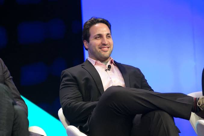 Kyle Samani speaking at a conference