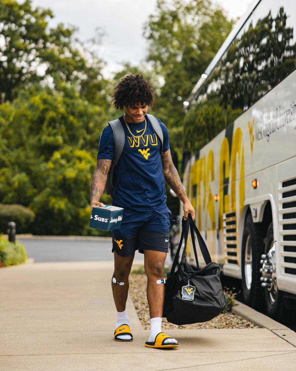 WVUfootball's tweet photo. Heading out 🚌 https://t.co/S6N0r0TQdz