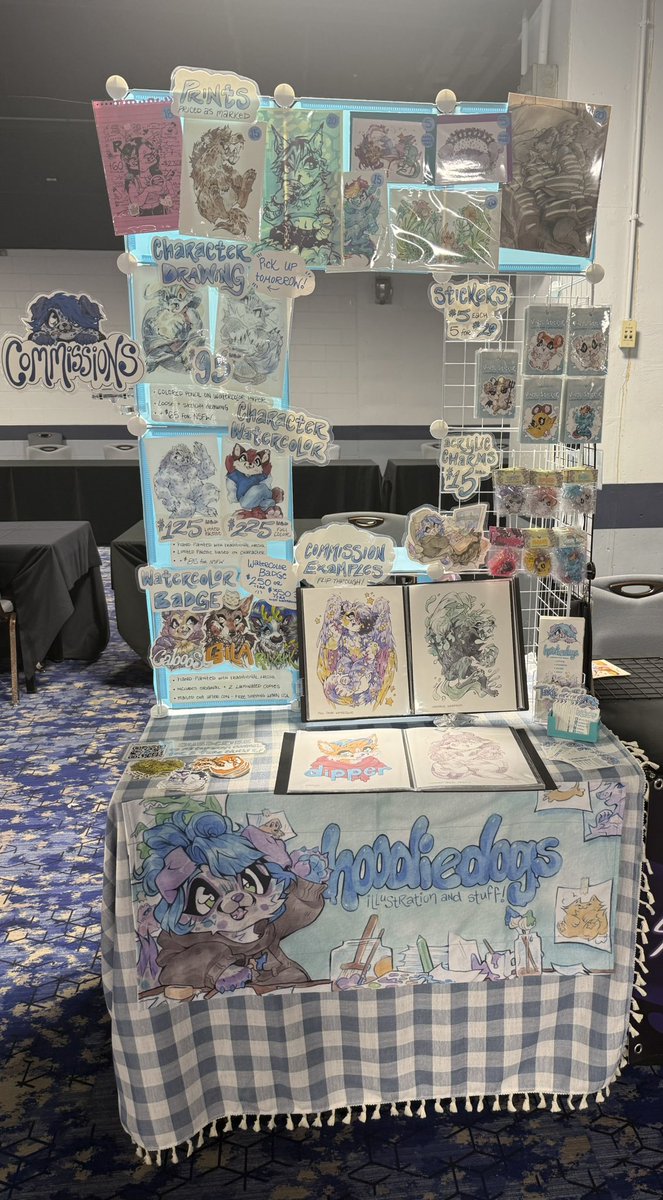 hoodiedogs_'s tweet image. all set up for the furry migration artist alley :D !! welcome to my beautiful city to anyone coming from far away - cant wait to see you this weekend 💞 as always i have 8 at-con drawing slots and that's it, everything else is open for december completion ^w^ stop by &amp;amp; say hi!