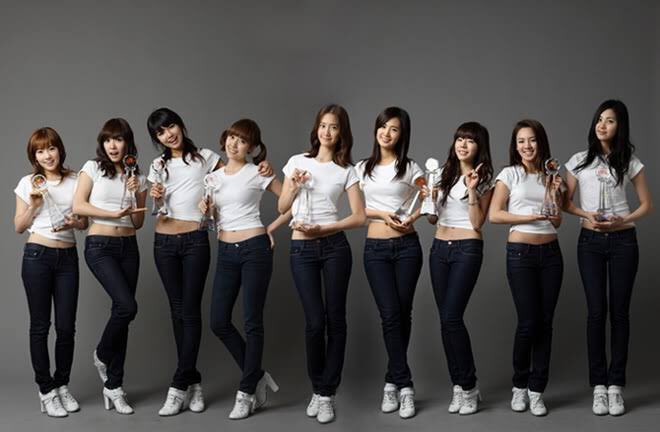 syjungies's tweet image. this pic of each snsd member holding a trophy from their 9 consecutive wins with gee