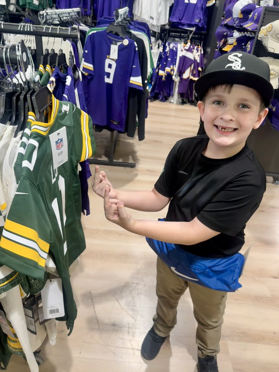 Lucas knows what’s up when he sees a Packers jersey at the store