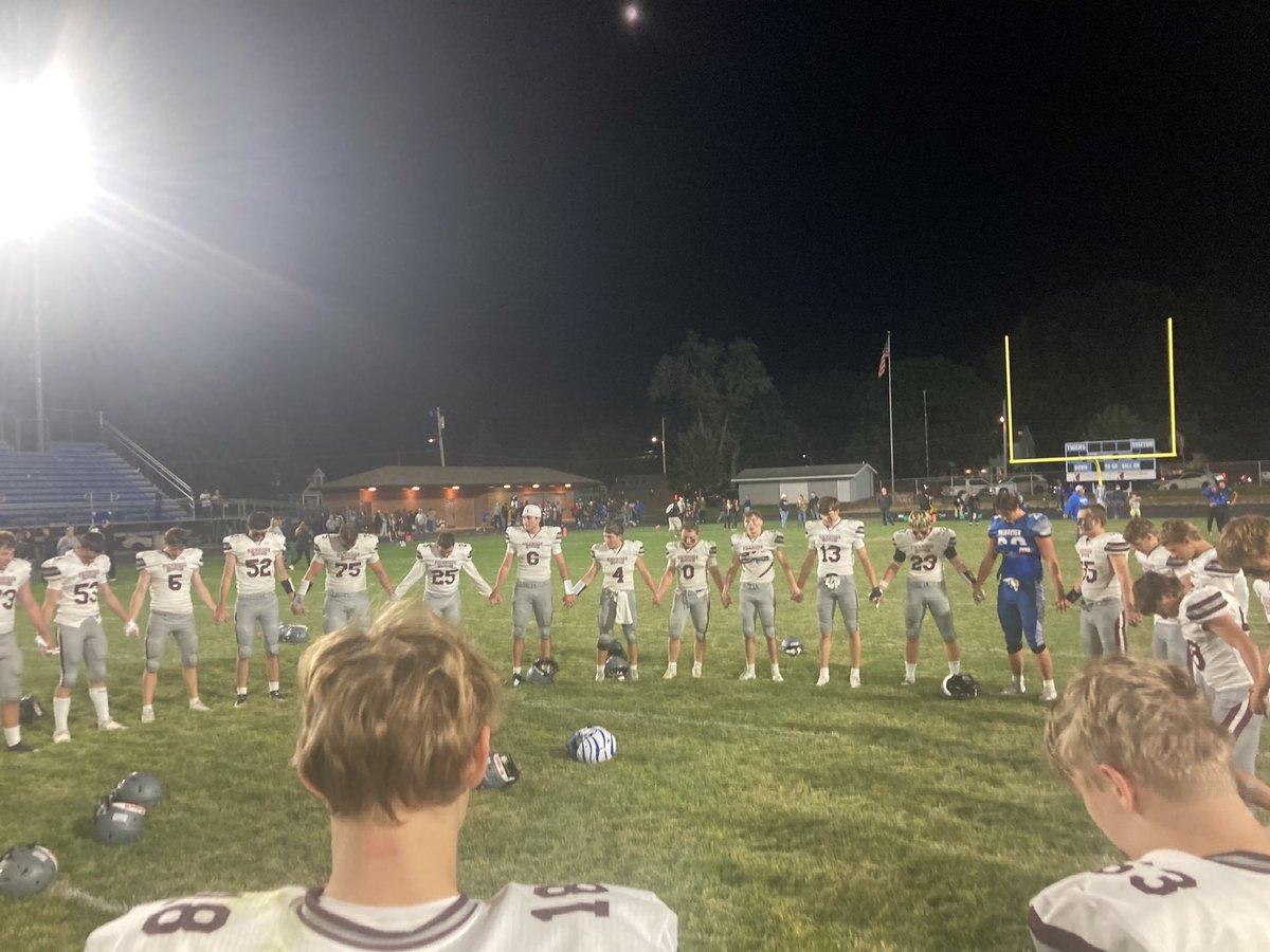 What a great thing to see both teams lining up for a prayer circle. There are bigger things than a game.