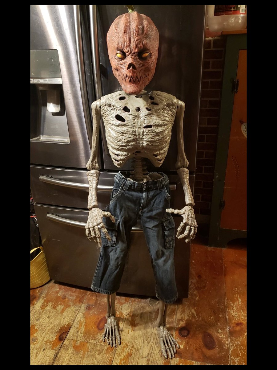 I threw an old Halloween mask over a Pose-N-Stay Corpse, gave it some clothes and hoped for... I'm not really sure but I kind of like it.