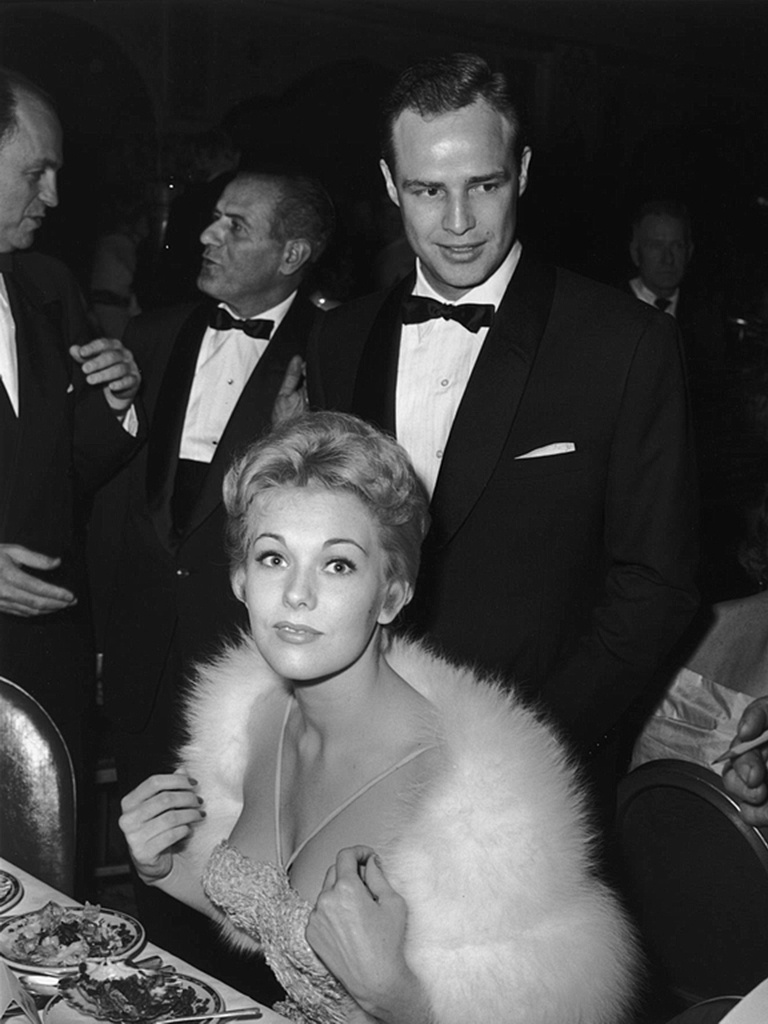 Kim Novak &amp; Marlon Brando, at an awards dinner, 1950s.
