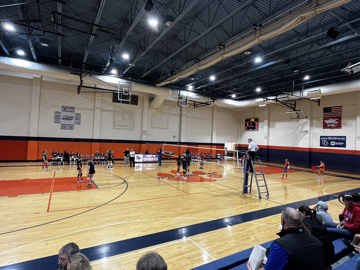 Watching 7th grade volleyball and cheering on #1!