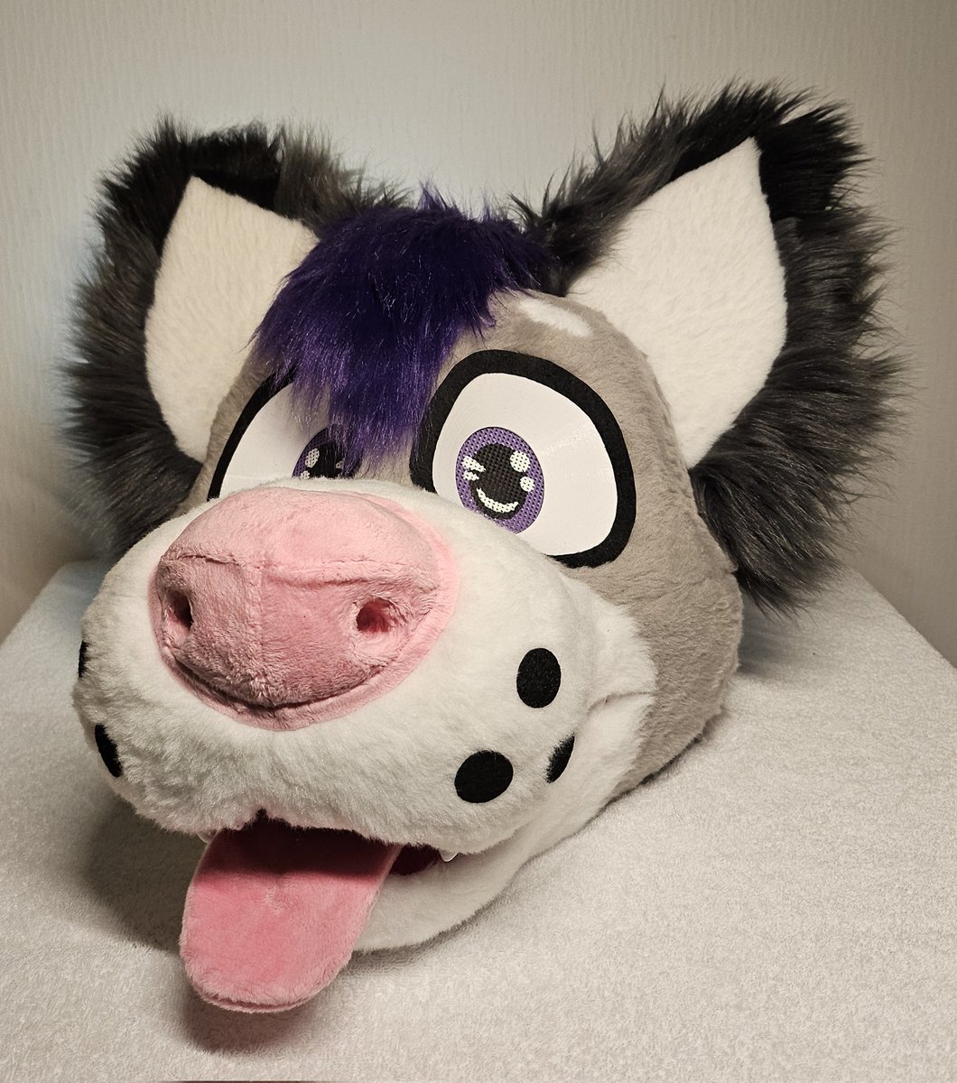 Fursuit head made with durable 3D printed head base with good ventilation, head strap and comfortable interior lined with minky. Featuring hand painted follow-me eyes, a poseable haircut and a detachable magnetic tongue.

Price: 1800€
Contact via telegram/discord: scargillthefox