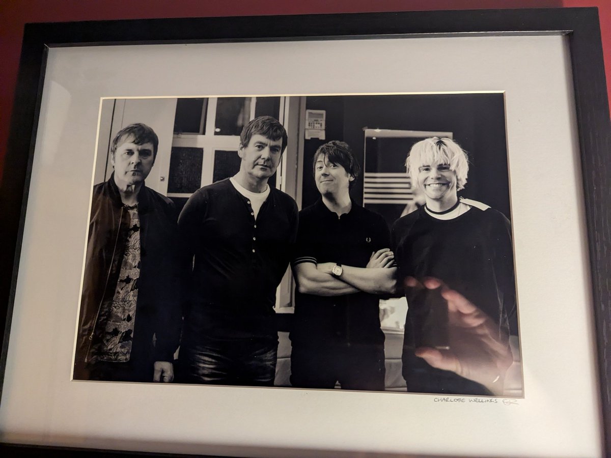 More of our fantastic <a href="/thecharlatans/">The Charlatans</a> photos from <a href="/CWellingsUK/">Charlotte Wellings</a> on our newly painted living room wall 🙂 <a href="/Tim_Burgess/">Tim Burgess</a> <a href="/TonyCharlatan/">Tony Rogers</a> <a href="/markcharlatan/">Mark Collins</a>