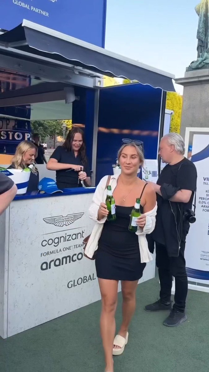 Maria16407605's tweet photo. We stopped by the Peroni Nastro Azzurro pits, where they had a replica of the @astonmartinf1 race car. 🏎️Thanks for a wonderful evening https://t.co/ZZQ89ZT49j