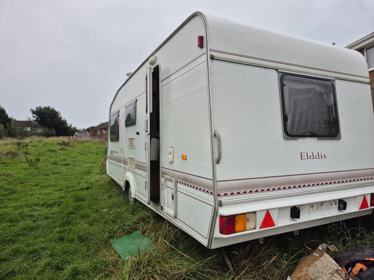 Abandoned caravan on the grass off Peplow near the train track <a href="/LancasterCC/">Lancaster City Council</a>