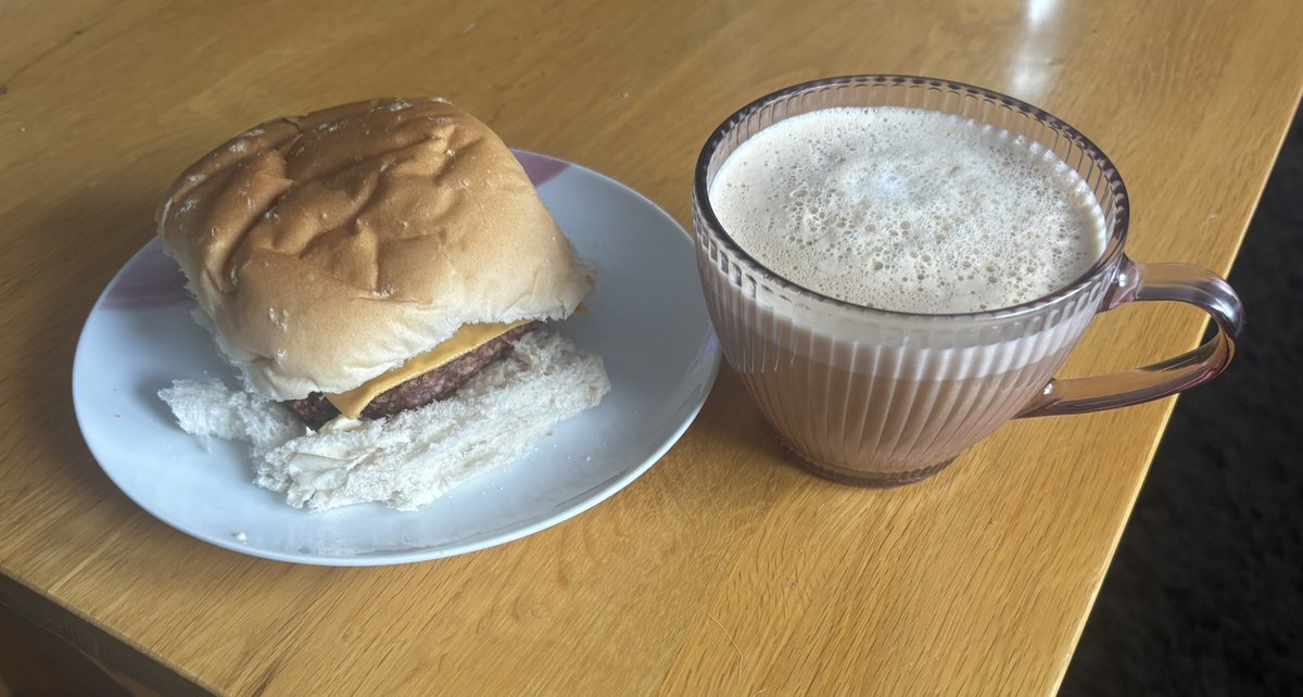 PrincessCarCar's tweet photo. Square sausage on a roll with a slice of cheese and a wee bit of tomato sauce and a frothy flat white! ☕️ bliss! 
H A P PY S U N D A Y 🙂 https://t.co/TfLANY4drt