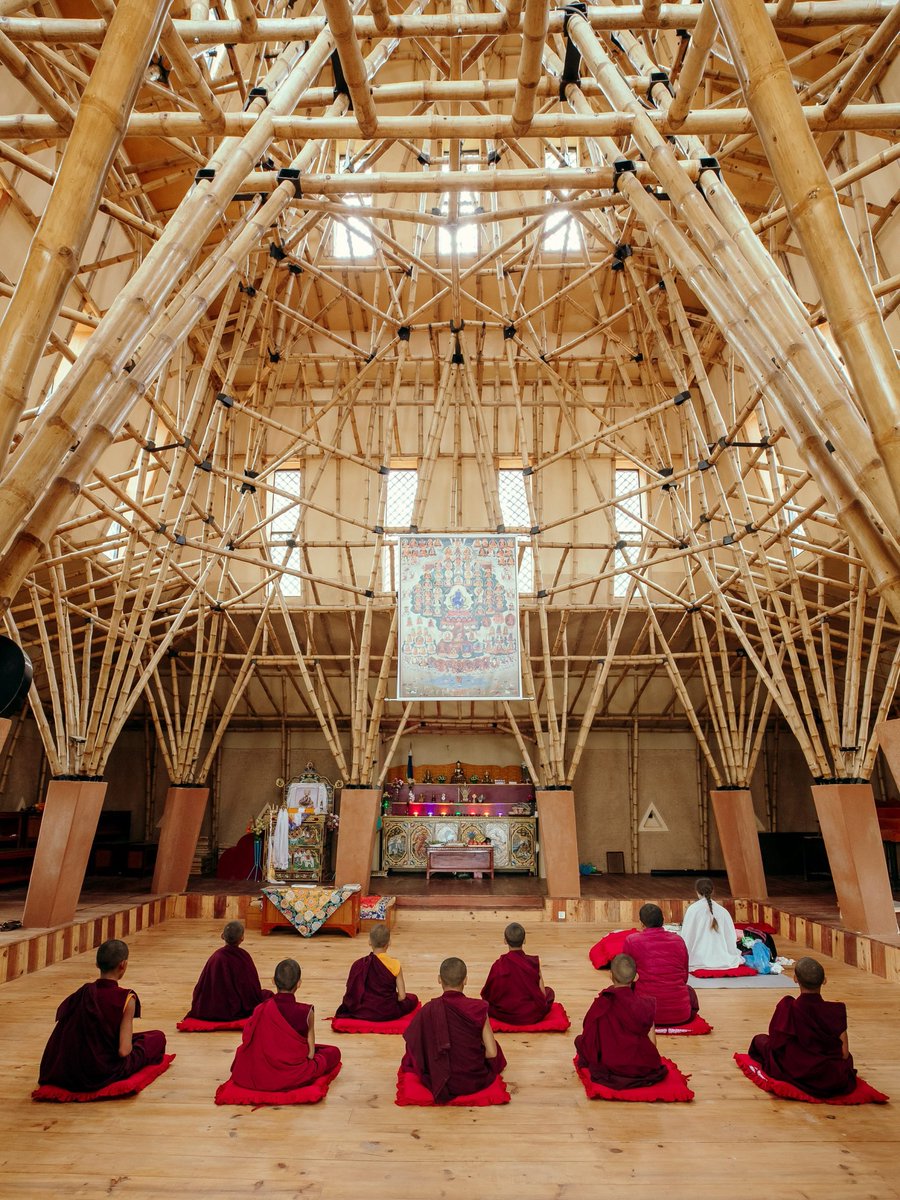 w_emerg's tweet image. What if Buddhist symbolism met #sustainable design?
Near Kathmandu, Abari (Nripal Adhikary) built the Mahamudra Meditation Centre with bamboo trusses shaped like a mandala . A blend of stupas, #rammedearth, #bamboo &amp;amp; copper craft, tradition + innovation in harmony.
#Nepal