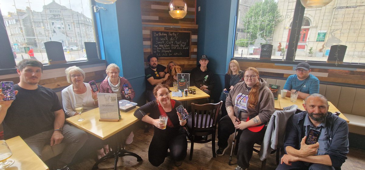A11yib's tweet photo. Great turn out in Aberdeen for @ingress #FirstSaturday #IngressFS where explored the City with a couple of banners, saw some hidden treasures as it was Doors Open Day and made some links.  We met in @theglentanar where the home made fudge and jam as prizes proved very popular. https://t.co/TAVvqnuHeM