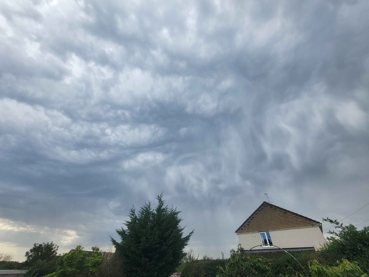 A downpour was heading for me earlier and this is a picture I took before it hit me. One of the best cloudscapes I have ever seen; asperitas, mammatus and virga all in one!